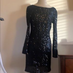 A sequence black dress.